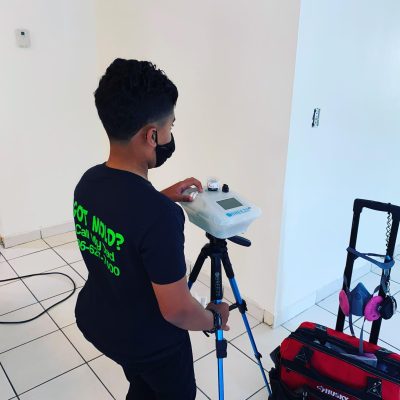 Certified inspector from Air Doctors conducting mold inspections, mold testing, particle count and allergen testing, asbestos surveys, sample collection, and water quality testing in a residential and commercial property in South Florida.