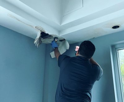 Certified inspector from Air Doctors conducting mold inspections, mold testing, particle count and allergen testing, asbestos surveys, sample collection, and water quality testing in a residential and commercial property in South Florida.