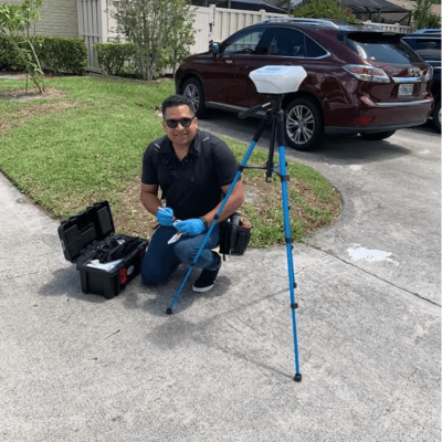 Certified inspector from Air Doctors conducting mold inspections, mold testing, particle count and allergen testing, asbestos surveys, sample collection, and water quality testing in a residential and commercial property in South Florida.