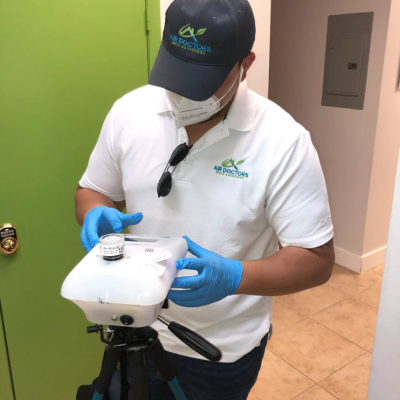 Certified inspector from Air Doctors conducting mold inspections, mold testing, particle count and allergen testing, asbestos surveys, sample collection, and water quality testing in a residential and commercial property in South Florida.